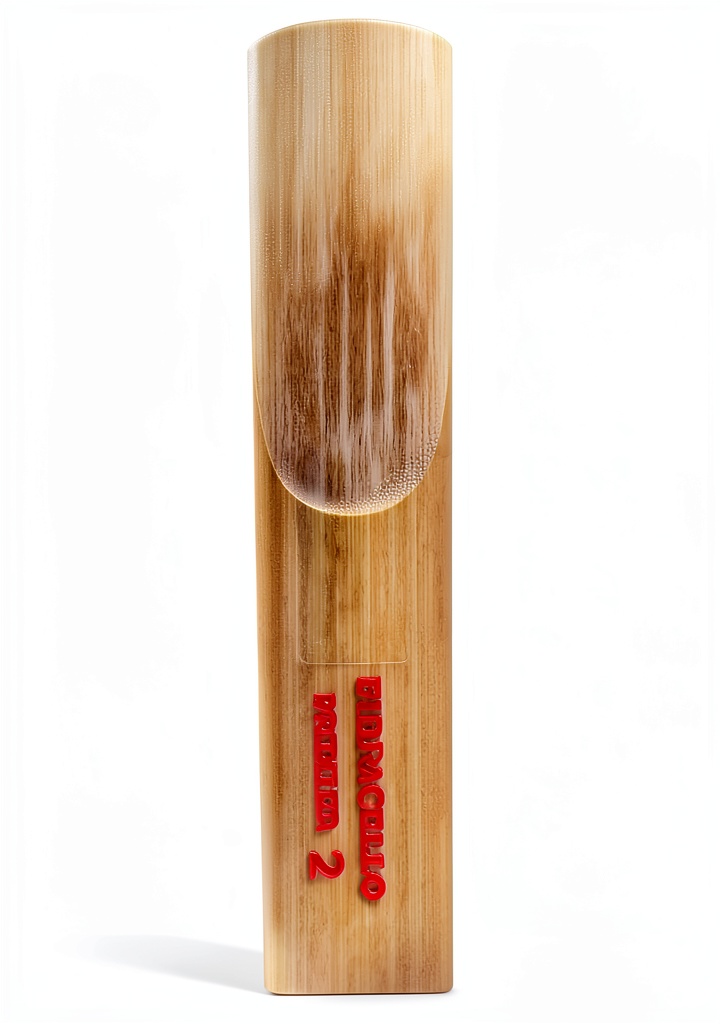 Installing Baritone Sax Reed FCBSP2 Synthetic Neutral on a wooden desk